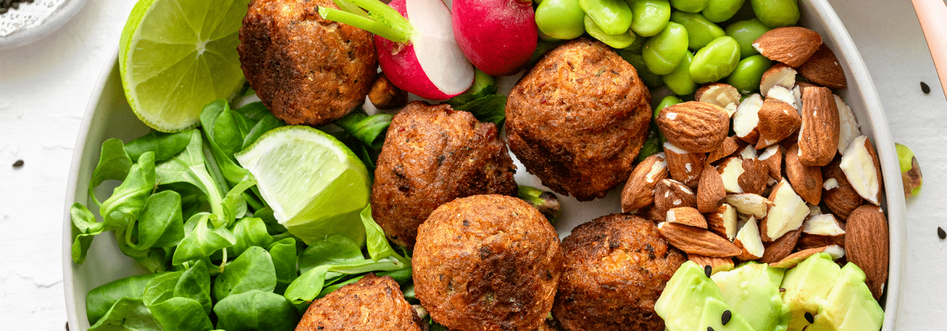 Nuggets with roasted sweet potato and a meal salad with peanut dressing